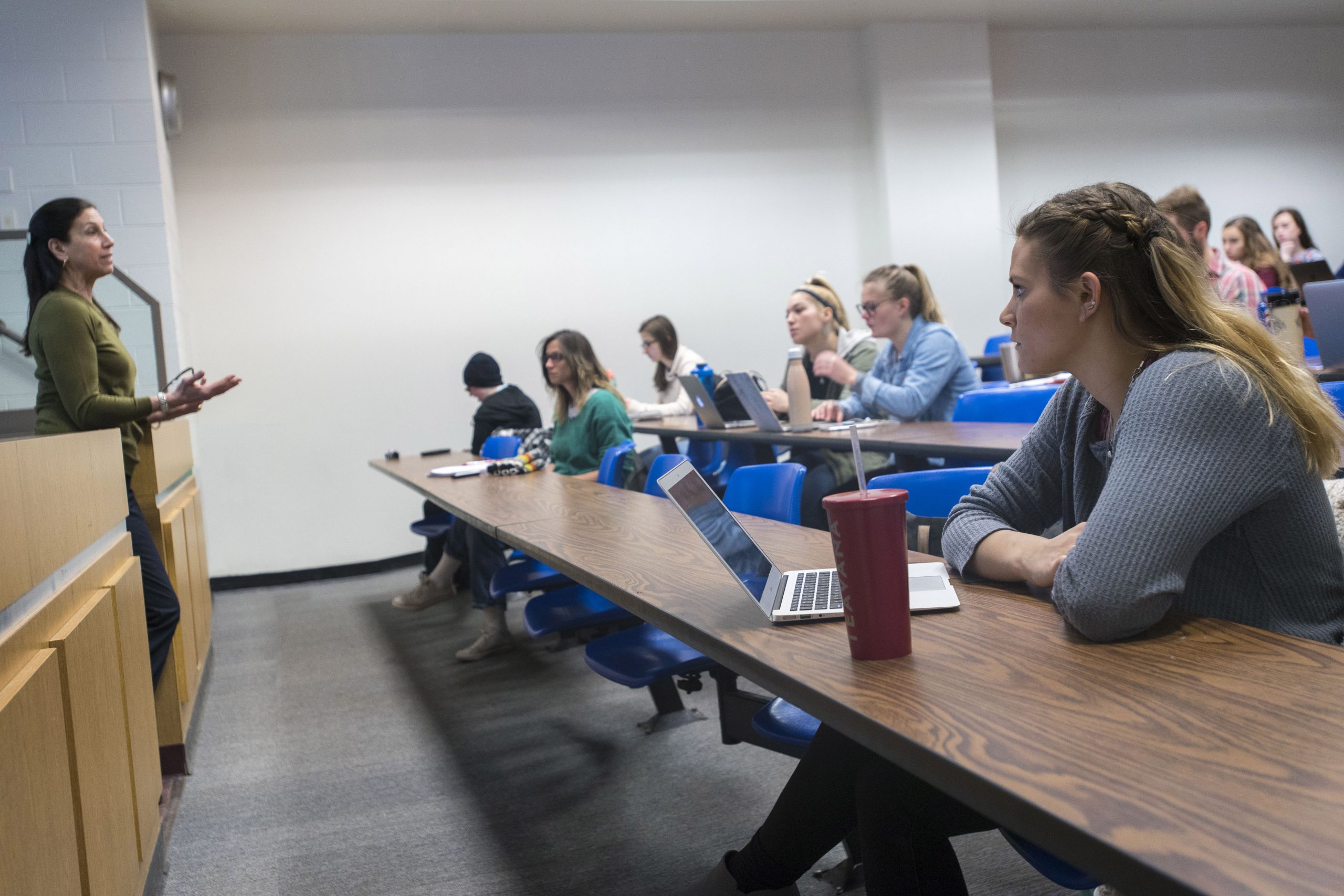 Student-athlete Monica Marcello ’18 (CAHNR) listening to a Medical Therapy Nutrition lecture by professor Nancy Rodriguez in the Engineering II Building on Feb. 28, 2018. (Sean Flynn/UConn Photo)